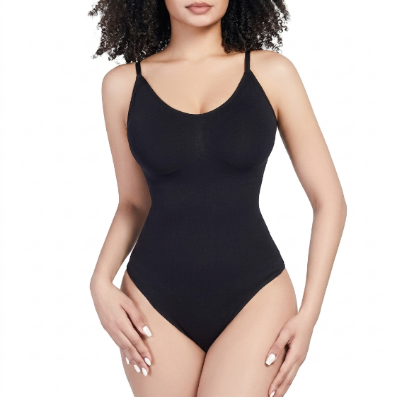 Seamless shaping bodysuit in black, worn, front view, photographed on white
